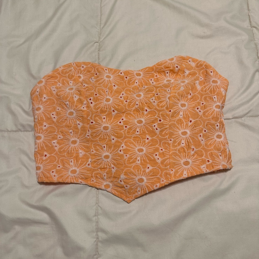 Orange floral strapless top